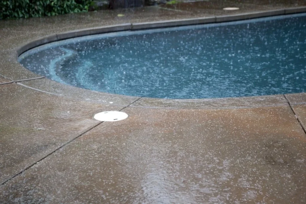 Rainfall at a backyard pool with drains